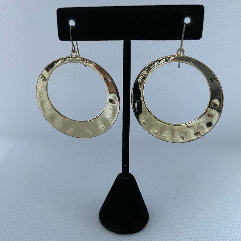 Round hollow hoop gold tone earrings